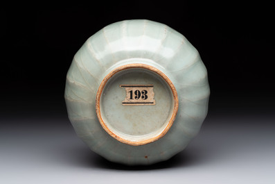 A Chinese Longquan celadon quintuple-tube vase, Yuan