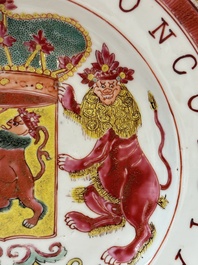 A rare Chinese famille rose armorial plate with VOC coat of arms, dated 1728, Yongzheng