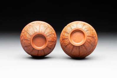 A set of five Chinese Yixing stoneware cups with floral design, Kangxi