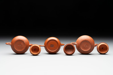 A small Chinese Yixing stoneware covered teapot and two Swatow Yixing-style covered teapots, Yixing Hui Mengchen 宜興惠孟臣製 and Shunji 順記 marks, 19/20th C