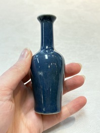 Three Chinese blue-glazed miniature vases on wooden stands and a claire-de-lune seal paste box and cover, 19th C.
