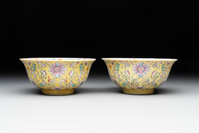 A pair of Chinese famille rose 'flower scroll' bowls, Jiaqing mark and of the period