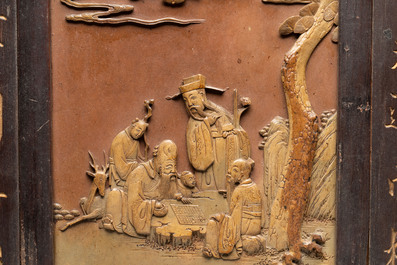 A Chinese carved stone 'Sanxing' plaque mounted in a wooden frame, 19th C.