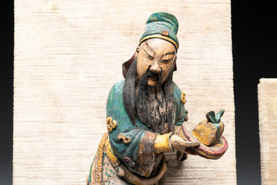 Three Chinese polychrome porcelain figures, 19th C.