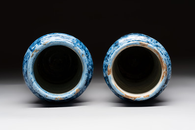 A pair of Spanish splashed blue pottery albarelli and an Italian blue, white and manganese albarello, Savona, 17/18th C.