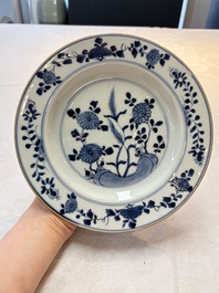 A Chinese Imari-style plate and a blue and white plate with floral design, Johanneum marks, ex-collection of August the Strong, Kangxi/Yongzheng