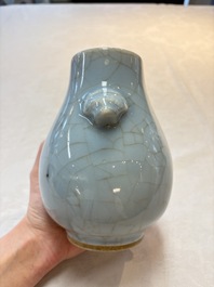Three Chinese claire-de-lune vases, one with a wooden stand, Yongzheng mark, 19/20th C.