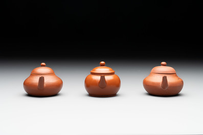 A small Chinese Yixing stoneware covered teapot and two Swatow Yixing-style covered teapots, Yixing Hui Mengchen 宜興惠孟臣製 and Shunji 順記 marks, 19/20th C
