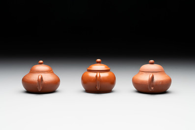 A small Chinese Yixing stoneware covered teapot and two Swatow Yixing-style covered teapots, Yixing Hui Mengchen 宜興惠孟臣製 and Shunji 順記 marks, 19/20th C