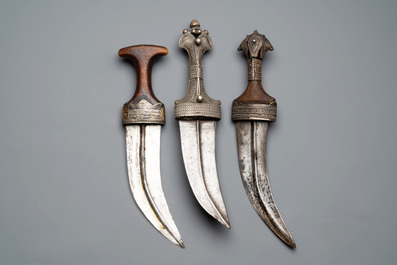 Three Omani Khanjars, one with Rhinoceros horn hilt, 19th C.