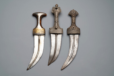 Three Omani Khanjars, one with Rhinoceros horn hilt, 19th C.