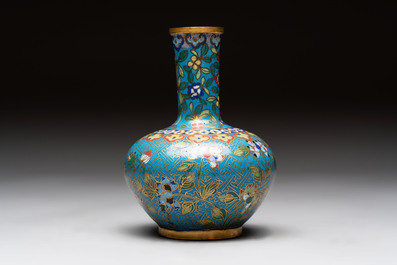A pair of Chinese cloisonn&eacute; candlesticks and three vases, 19/20th C.