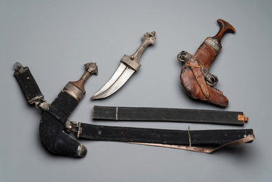 Three Omani Khanjars, one with Rhinoceros horn hilt, 19th C.
