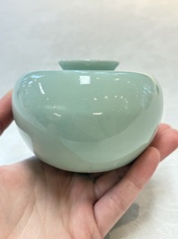 A Chinese celadon-glazed water pot and a ge-type water pot on wooden stands, Qianlong mark, 19th C.