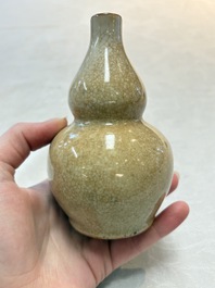 Two Chinese ge-type double-gourd vases, one with a wooden stand, 19th C.