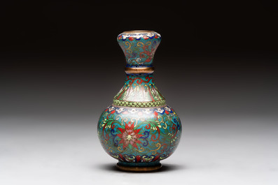 A pair of Chinese cloisonn&eacute; candlesticks and three vases, 19/20th C.