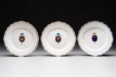 Five gilt-decorated and blue-enamelled Tournai porcelain plates, golden crossed swords and four crosses marks, 18th C.