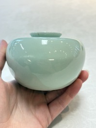 A Chinese celadon-glazed water pot and a ge-type water pot on wooden stands, Qianlong mark, 19th C.