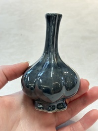 Four Chinese monochrome wares and two wooden stands, 19th C.