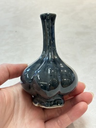 Four Chinese monochrome wares and two wooden stands, 19th C.