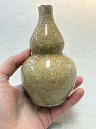 Two Chinese ge-type double-gourd vases, one with a wooden stand, 19th C.