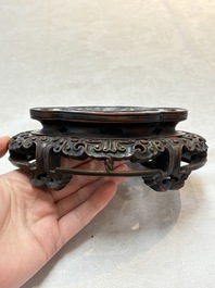 A fine Chinese teadust-glazed quadrifoil jardini&egrave;re with an openworked wooden stand, Yongzheng mark and of the period