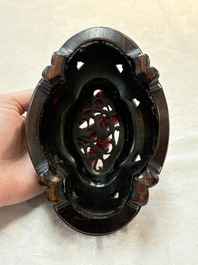 A fine Chinese teadust-glazed quadrifoil jardini&egrave;re with an openworked wooden stand, Yongzheng mark and of the period