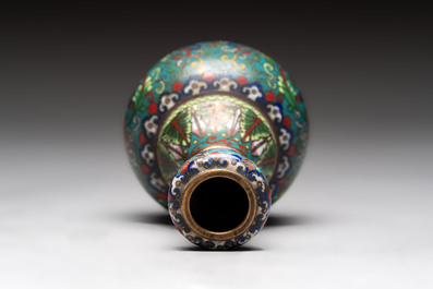 A pair of Chinese cloisonn&eacute; candlesticks and three vases, 19/20th C.