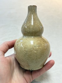 Two Chinese ge-type double-gourd vases, one with a wooden stand, 19th C.