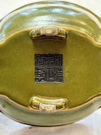 A fine Chinese teadust-glazed quadrifoil jardini&egrave;re with an openworked wooden stand, Yongzheng mark and of the period