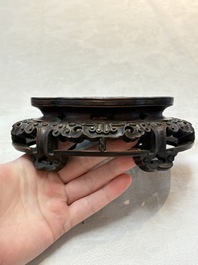 A fine Chinese teadust-glazed quadrifoil jardini&egrave;re with an openworked wooden stand, Yongzheng mark and of the period