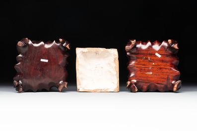 Three Chinese turquoise-glazed 'gu' vases with floral design, two with wooden stands, Ming