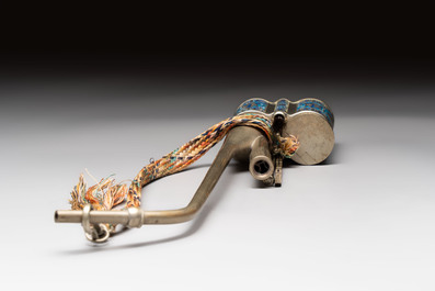 Two Chinese enamelled paktong opium pipes, an opium lamp and a cloisonn&eacute; opium lamp, 19/20th C.