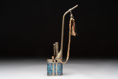 Two Chinese enamelled paktong opium pipes, an opium lamp and a cloisonn&eacute; opium lamp, 19/20th C.