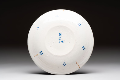 A blue and white Dutch Delft chinoiserie Kangxi-style 'Long Eliza' double gourd vase and a plate, early 18th C.