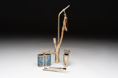 Two Chinese enamelled paktong opium pipes, an opium lamp and a cloisonn&eacute; opium lamp, 19/20th C.