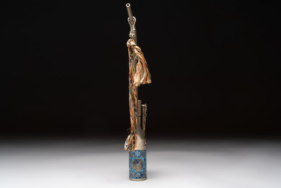 Two Chinese enamelled paktong opium pipes, an opium lamp and a cloisonn&eacute; opium lamp, 19/20th C.