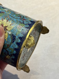 A Chinese cloisonn&eacute; cylindrical tripod censer with lotus scrolls, Qianlong mark and of the period