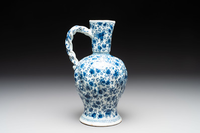 A fine blue and white Dutch Delft ewer with twisted rope handle, ca. 1700