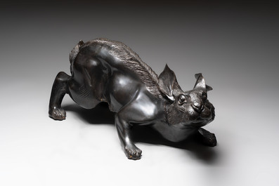 A large Japanese bronze sculpture of a reclining hare, 20th C.
