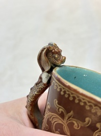 A Chinese gilt-decorated brown-glazed libation cup with a chilong-form handle, Qianlong mark and of the period