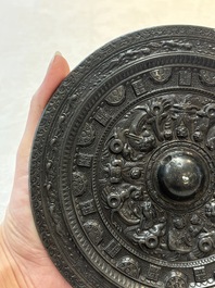 A Chinese finely cast 'immortals' bronze mirror, Wu Zuo Ming Jing 吾作明鏡 mark, Eastern Han