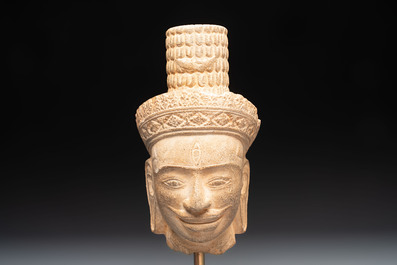 A Khmer Angkor Wat-style sandstone head of Shiva, probably 12th C.
