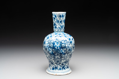 A fine blue and white Dutch Delft ewer with twisted rope handle, ca. 1700