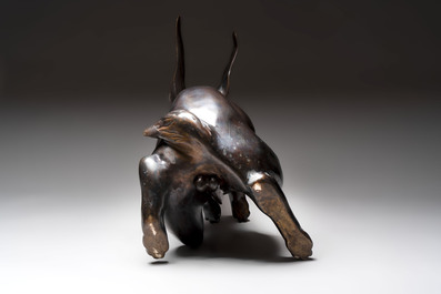 A large Japanese bronze sculpture of a sitting hare, 20th C.