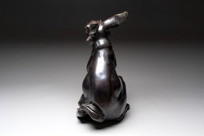 A large Japanese bronze sculpture of a sitting hare, 20th C.
