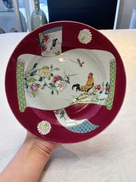 A pair of Chinese famille rose ruby-ground 'scrolls and rooster' plates, Yongzheng