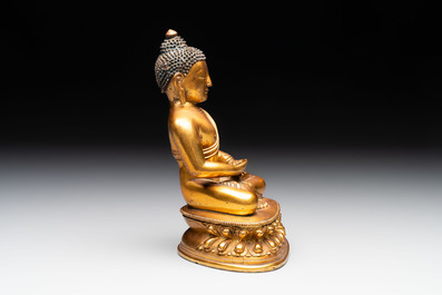 A fine Sino-Tibetan gilt-bronze figure of Buddha Shakyamuni, 17th C.
