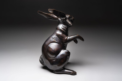 A large Japanese bronze sculpture of a sitting hare, 20th C.
