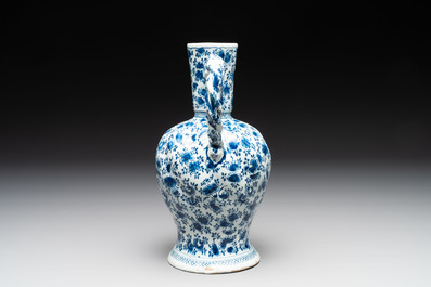 A fine blue and white Dutch Delft ewer with twisted rope handle, ca. 1700